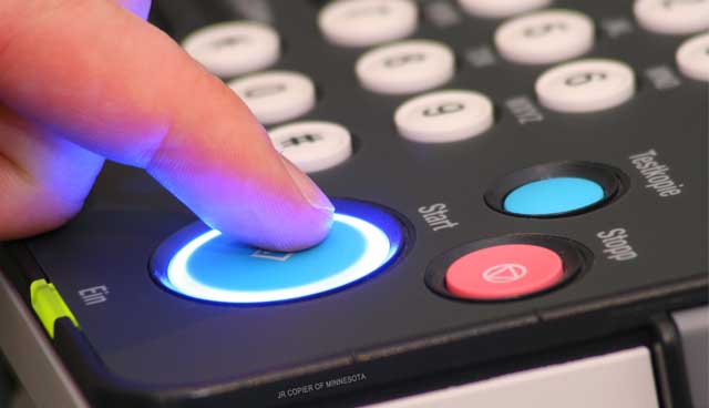Close-up of copier control panel buttons for office equipment leasing